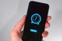Apple has confirmed it is working to fix an issue that is causing some iPhone alarms to not play a sound (Selwyn/Alamy/PA)