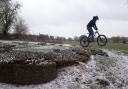 The biker rode along the Roman wall ruins in Verulamium Park - which are thought to date back to around 270AD