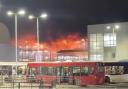 A large blaze that was declared a major incident at a multi-storey car park in Luton was started accidentally, an investigation has found.