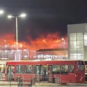 A large blaze that was declared a major incident at a multi-storey car park in Luton was started accidentally, an investigation has found.