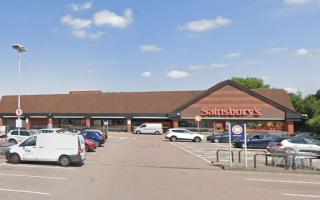 A Luton teenager has been arrested as part of an investigation into the theft of £12,000 worth of alcohol from Sainsbury's.