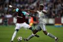 West Ham United's Cheikhou Kouyate (left) and Manchester United's Paul Pogba battle for the ball (pic: Nick Potts/PA)