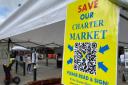 Fifty St Albans charter market traders have filed a formal complaint against a Lib Dem councillor.