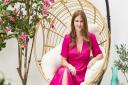 Millie Mackintosh on her patio, which has been given a makeover by Wayfair and features an Artificial Bougainvillea Flowering Tree, £259.99; Sicilia Decorative Plates by Villa d'Este Home (similar), from £50.99, all Wayfair. Picture: Alexander Edwards/W