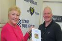 Jane Slatter from the St Albans Soroptimists presented Radio Verulam presenter Steve Simpson with a Toilet Twinning certificate. Picture: St Albans Soroptimists