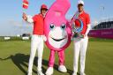 Thorbjorn Olesen and Lucas Bjerregaard of Denmark pose with the trophy and the GolfSixes mascot after winning the final match between Denmark and Australia during day two of GolfSixes at The Centurion Club on May 7, 2017 in St Albans, England.  [Photo by