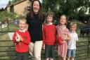 Bernard's Heath Infant School summer event with Ark Farm. Pictured are headteacher Hannah Rimmer with children from the school. Picture: NEIL LUPIN