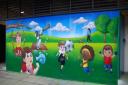 The finished mural which depicts the activities that take place in the recreation ground