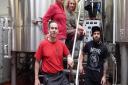Justin Hawke, his wife Maryann and the brewing team at Moor Beer