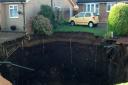 Close-up photos of the sinkhole in Fontmell Close, off the top of Seymore Road in St Albans, which appeared at 1am on October 1