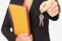 Real estate agent holding keys