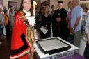Former Mayor of St Albans Cllr Annie Brewster with the Magna Carta during its visit to the city