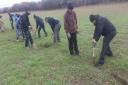 Volunteers from Ahmadiyya Muslim Youth Association plant trees at Heartwood Forest