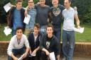 Boys from St Columba's pose with their results