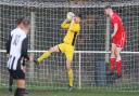 Connor Sansom saved a penalty in the shootout win over London Colney in the Dave Brock Cup.