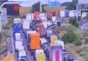 A traffic camera on the M25 clockwise shows queues between Hatfield and Potters Bar at 4.50pm today (June 21)