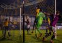 Jake Hutchinson scores for Hitchin Town against St Albans City.