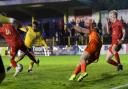 Zane Banton seals the win for St Albans City in the FA Cup with the third goal against Met Police.