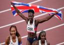 Great Britain's Imani-Lara Lansiquot, Daryll Neita, and Dina Asher-Smith after winning bronze in the 4x100m relay final at Tokyo 2020 Olympics.