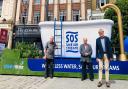 Cllrs Keith Hoskins, Paul Clark and Steve Jarvis at Affinity Water's SOS bathtub in Market Place, Hitchin