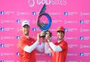 Lucas Bjerregaard and Thorbjørn Olesen of Denmark pose with the trophy after winning the final match between Denmark and Australia during day two of GolfSixes at The Centurion Club on May 7, 2017 in St Albans, England. [Photo by Andrew Redington/Getty