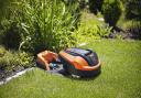 1. The Flymo 1200 R robotic lawnmower and charging station. Picture: Flymo/PA