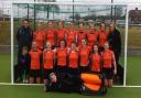 St Albans Hockey Club's Ladies' 2nds with coach Dick Ashby and mascot Darcy. 
Back row L-R: Dick Ashby, Hayley Payne, Lou Akers, Annie Barratt, Sarah Fretwell, Fiona Nekeman, Sim Burns, Joelle Weston, Emily Panniers. Middle row L-R: Darcy, Julie