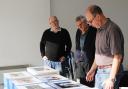 Members of the Carers’ Camera Club prepare for their third photography exhibition.