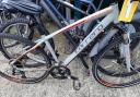 A grey and orange Carrera Cross Fire 3 was one of the stolen bikes.