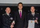 Tim Lewis (centre) received an award for bravery.