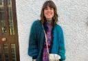 Caroline Jones, who once wore a different second-hand outfit from Cancer Research UK shops every day for a year to raise the money has snowballed into a campaign which raised the money for the charity