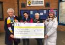 The Mayor (far left) and Cllr Madoc (far right) handed the cheque to Open Door Treasurer Lindsey McLeod (2nd from right) outside St Albans City and District Council’s offices