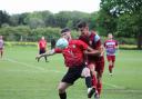 Jack Woods of Strafford Arms battles Joshua Cross of Six Bells for the ball. Picture: DONNA NG/DNMED_IA