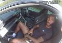 A screen grab taken from bodyworn video footage shows Raheem Sterling being detained by police officers after crashing his Lamborghini (Crown Prosecution Service/PA).