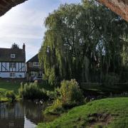 Some of the village's prettiest homes overlook the River Colne