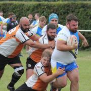 Josh Lawrence on his way to score for St Albans Centurions.