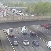 Traffic queuing near Redbourn following a multi-vehicle crash on the M1 northbound at Luton (furthest carriageway)