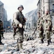 Adam Goldberg as Private Mellish, Edward Burns as Private Reiben, Tom Hanks as Captain Miller, Matt Damon as Private Ryan, Max Martini as Corporal Henderson and Tom Sizemore as Sergeant Horvath in Saving Private Ryan.