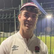Max Eke of Harpenden Rugby Club with his England U18s cap.