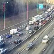 A tree has fallen onto the M25 at Watford amid Storm Eunice, causing queues.