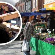 Councillors voted on Wednesday (inset) to save St Albans Charter Market's iconic, blue and yellow traditional stalls