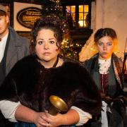The cast of OVO's Christmas production of The Chimes outside Ye Olde Fighting Cocks in St Albans.