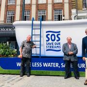 Cllrs Keith Hoskins, Paul Clark and Steve Jarvis at Affinity Water's SOS bathtub in Market Place, Hitchin
