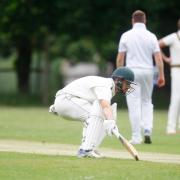 Adam Hounslow and Max Capaldi run between the wickets for St Albans against Knebworth Park.