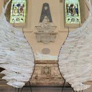 The Solace glass wings installation at St Albans Cathedral.