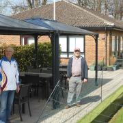Secretary Brian Moores and greenkeeper Keith Davison, in front of the new gazebo, have been part of the team preparing Harpenden Bowling Club for the new season.