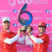Lucas Bjerregaard and Thorbjørn Olesen of Denmark pose with the trophy after winning the final match between Denmark and Australia during day two of GolfSixes at The Centurion Club on May 7, 2017 in St Albans, England. [Photo by Andrew Redington/Getty