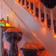 So spooky:  100 Amber LED Connectable Fairy Lights Clear Cable, £25; Jaunty Jack Lifesize LED Pumpkin, £12.99; Two Purple Glitter LED Glitter Candles, £3.99; Three Charcoal Black Tissue Paper Pom Poms, £1.99; 60g White Spider Web & Six Spiders,