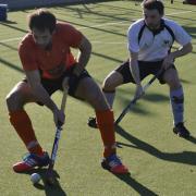 Action from St Albans Hockey Club's men's 1sts rout of Dereham.