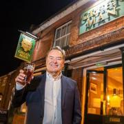 The Sky Sports star acted as quizmaster as the pub raised £1,000 for charity.